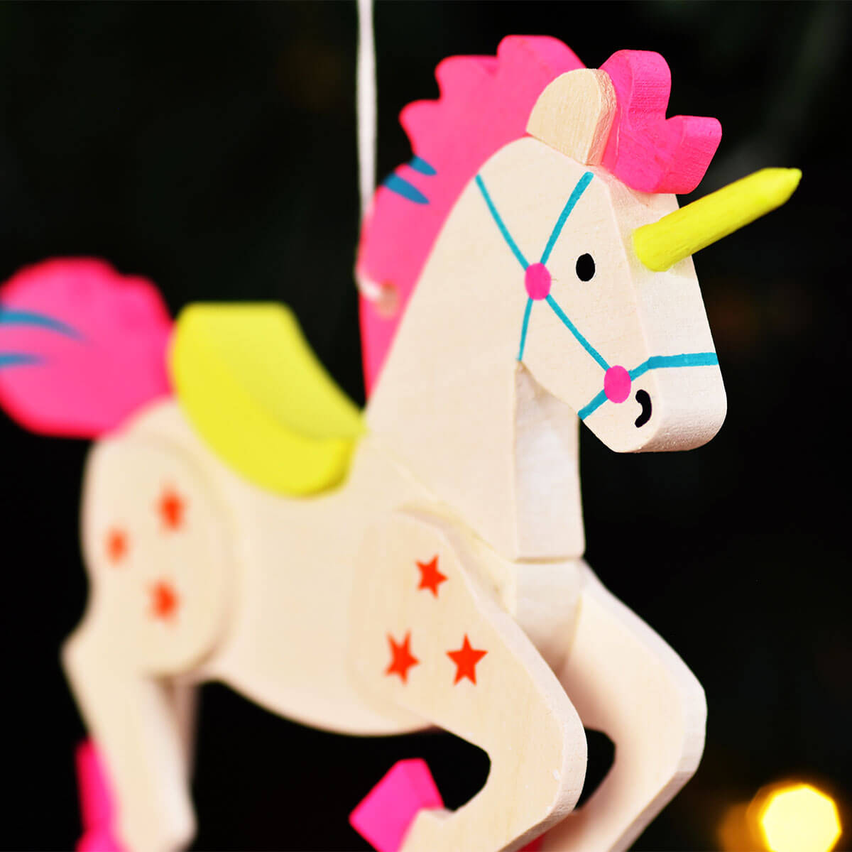 Neon-Einhorn als Baumschmuck gelb & pink
