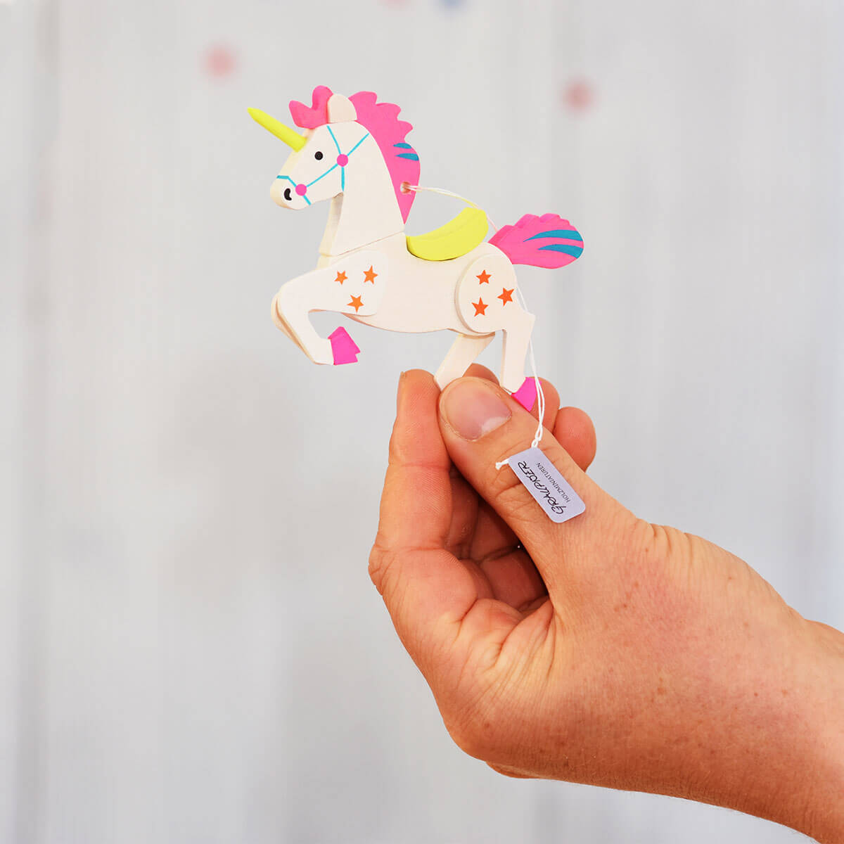 Neon-Einhorn als Baumschmuck gelb & pink