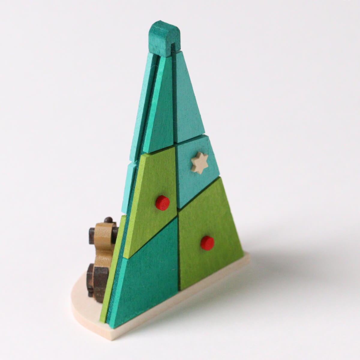 Baum mit Winterkind als Baumschmuck mit Katze